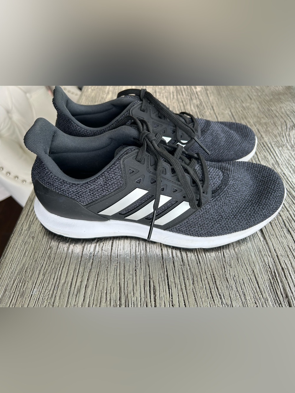 adidas Women’s dark grey Solyx Sneakers with silver Stripes